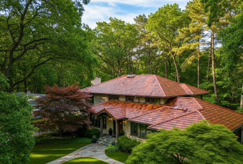 Residential home exterior surrounded by trees