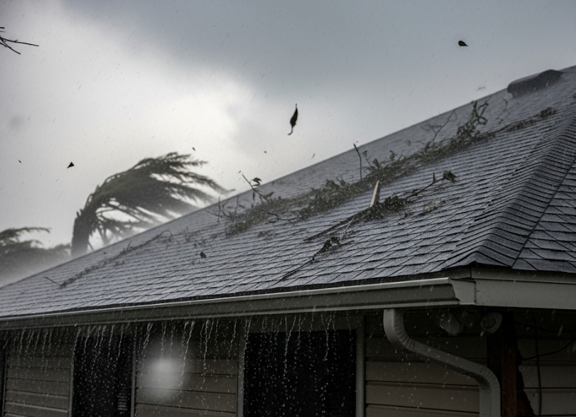 asphalt shingle roof while it's raining during a hurricane