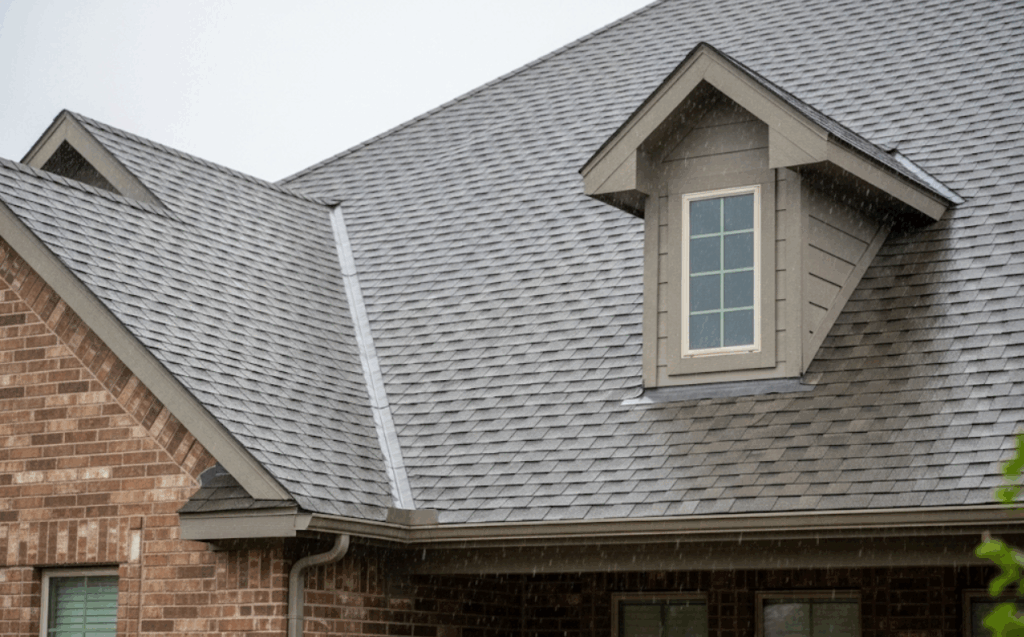 Texas-style single-family home with repaired roof under the rain