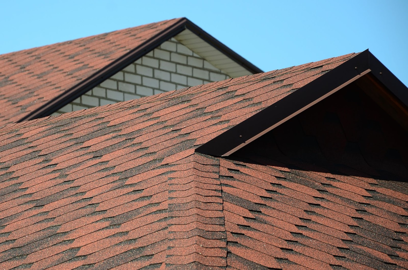 roof shingles, representing work by local roofing companies