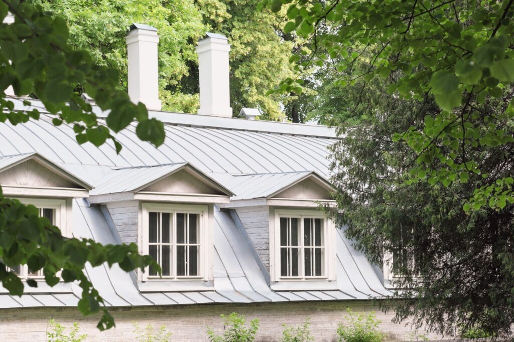 roof of house with attic and chimney