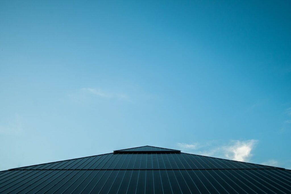 roof with blue sky overhead