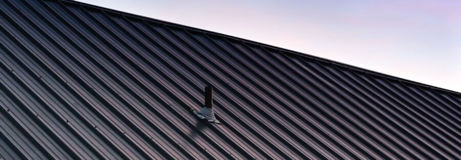 house with metal roof, representing metal roof installation services