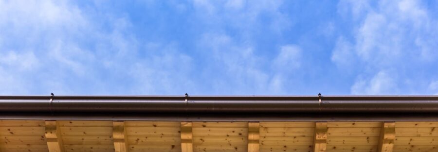 roof, representing the necessity of gutter and drainage checks