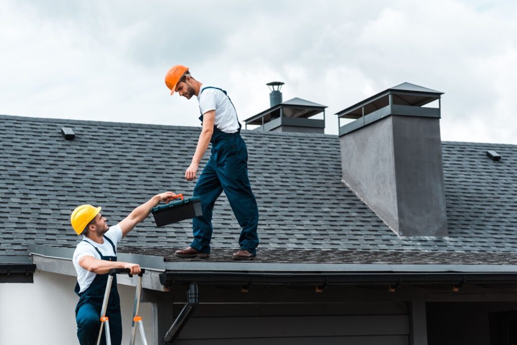 people working on a roof