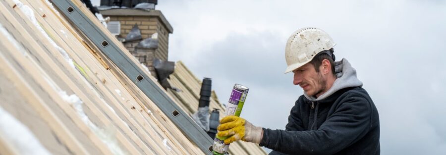 roofing team at work, representing importance of a roof estimate guide for DFW Texas