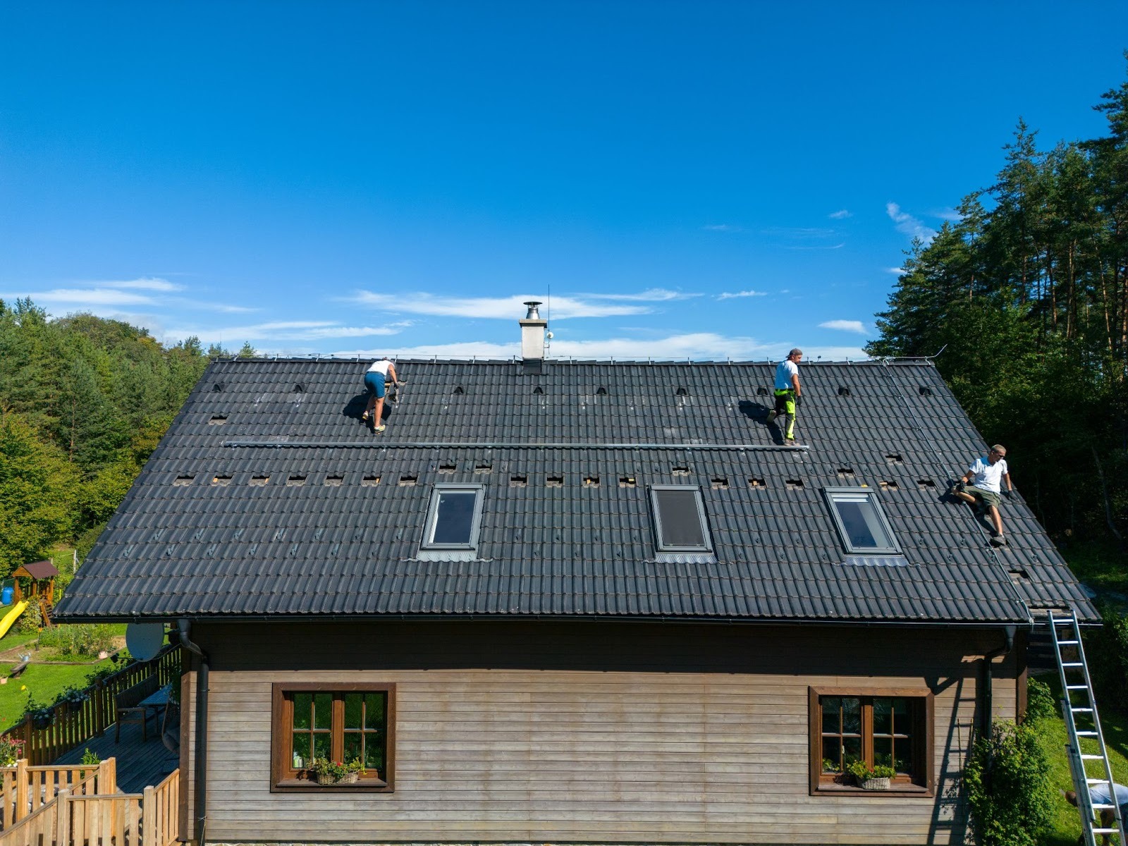 roofing contractors at work