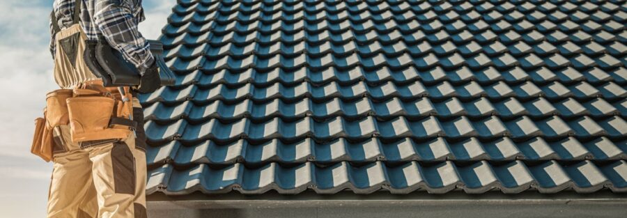 man considering how to fix roof tiles